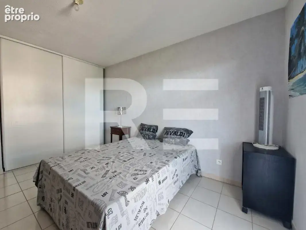 Nimes appartement 63 m² avec 2 chambres terrasse de 18 m² et garage - photo 7