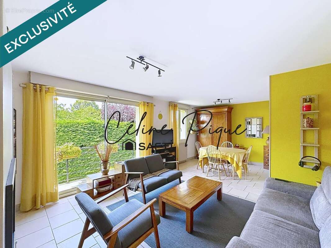 Maison 110 m² à Feuguerolles-Bully  - photo 2