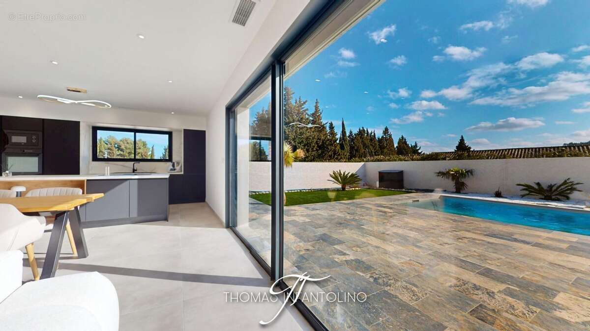 En exclusivite - plain pied - 4 chambres - piscine - garage - photo 2