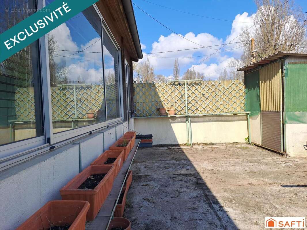 Photo 4 - Maison à FEUGAROLLES