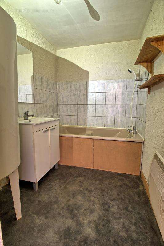 Immeuble de rapport avec 2 appartements et une maison - photo 17