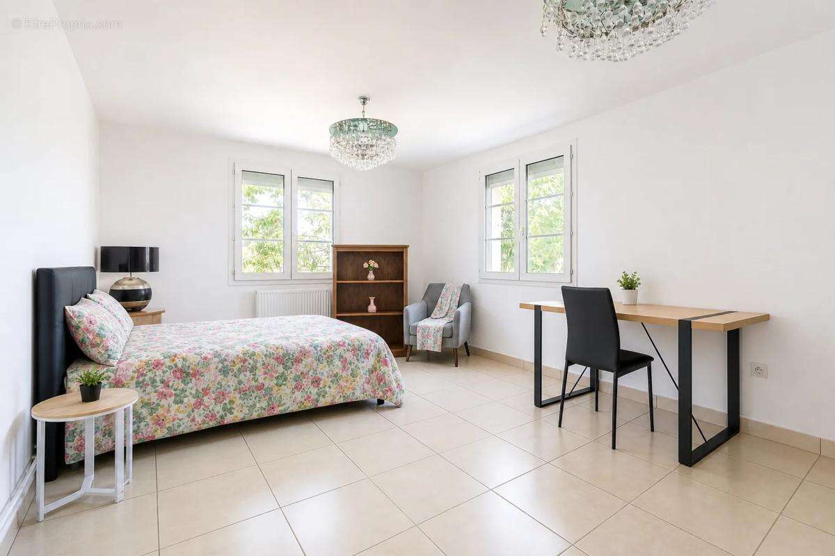 Maison de 5 pièces de 150 m² située à Sainte-Savine - photo 21