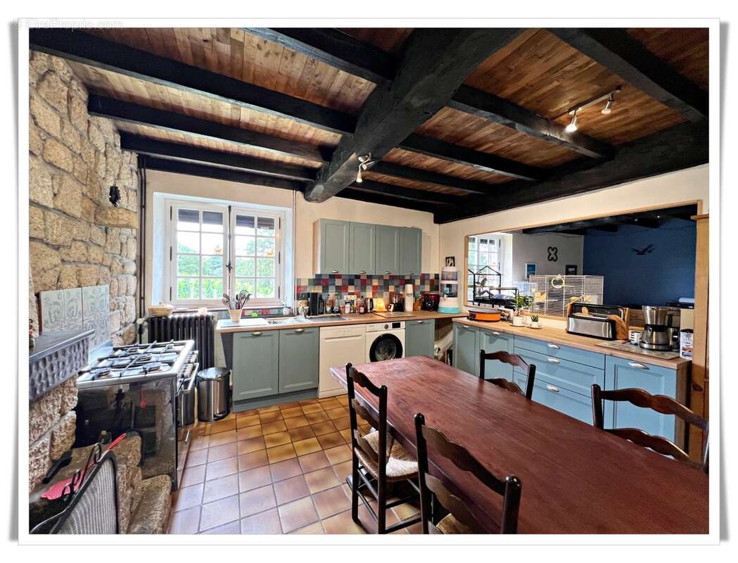 Maison à vendre 6 pièces PLUMELIAU (56) Propriété en pierre au cœur de la nature – Un cadre de vie enchanteur - photo 4