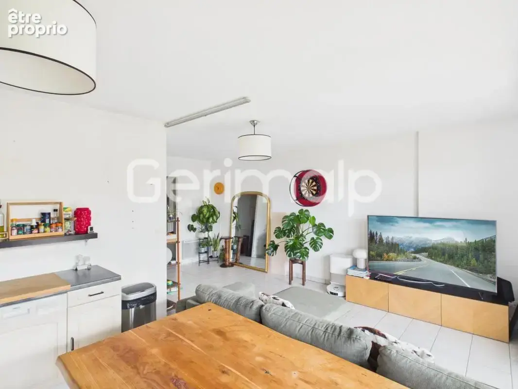 Vente - Appartement - 3 pièces + cuisine - 61 m² - 338 000 € - - photo 4