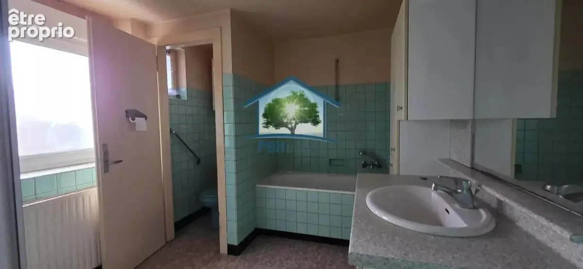 DANNEMARIE (68) - Maison mitoyenne de 7 pièces avec grande grange et terrain constructible - photo 10