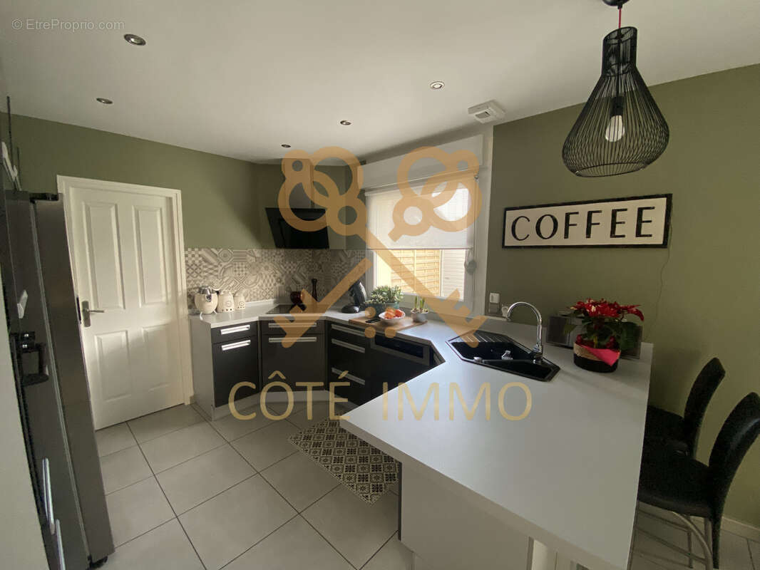 Maison à COURRIERES