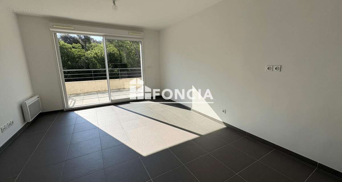 Les CAMOINS T2 Terrasse sans vis à vis  et garage - photo 7