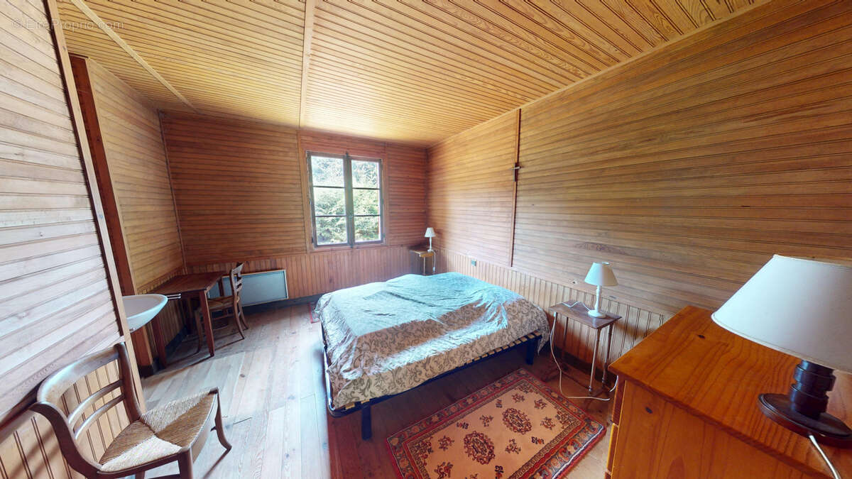 Chalet en bois sur sous sol et terrain attenant boisé - photo 11