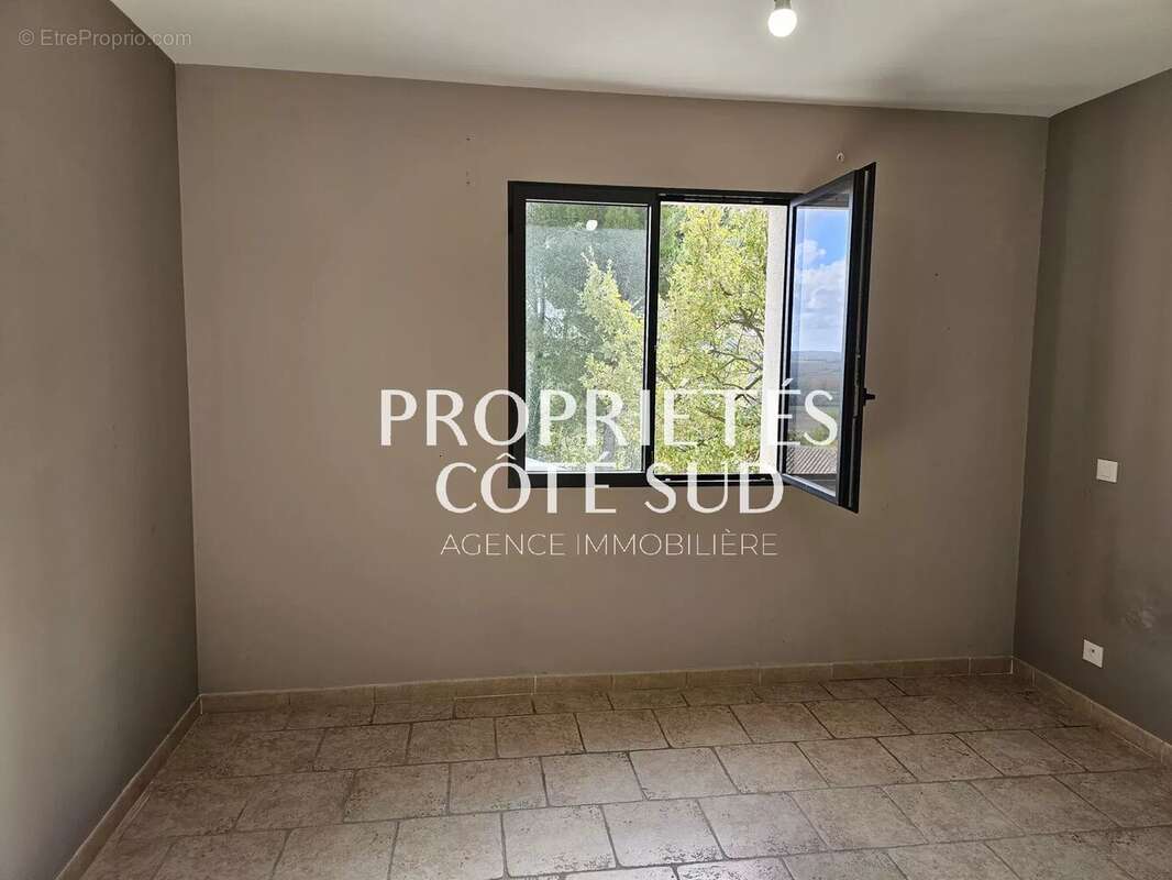 Maison à LAUDUN-L&#039;ARDOISE