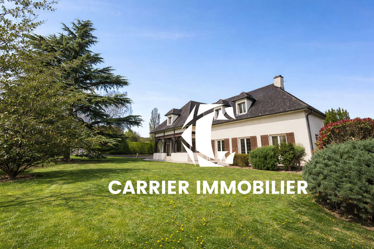 Maison à SAINT-GENIS-LES-OLLIERES