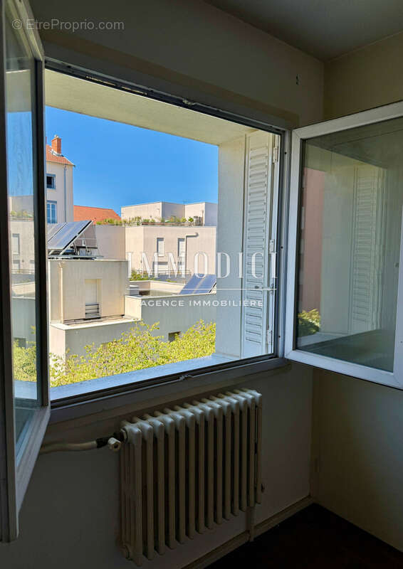 T3 traversant de 52 m2 au cœur du quartier États-Unis - 2ᵉ étage d'une copropriété - photo 8