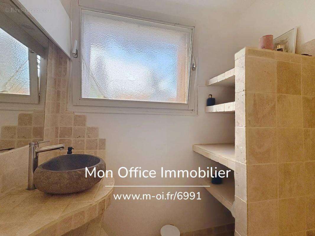 Référence : 6991-les. - appartement rénové proche centre en rez de chaussée à cavalaire sur mer - photo 12