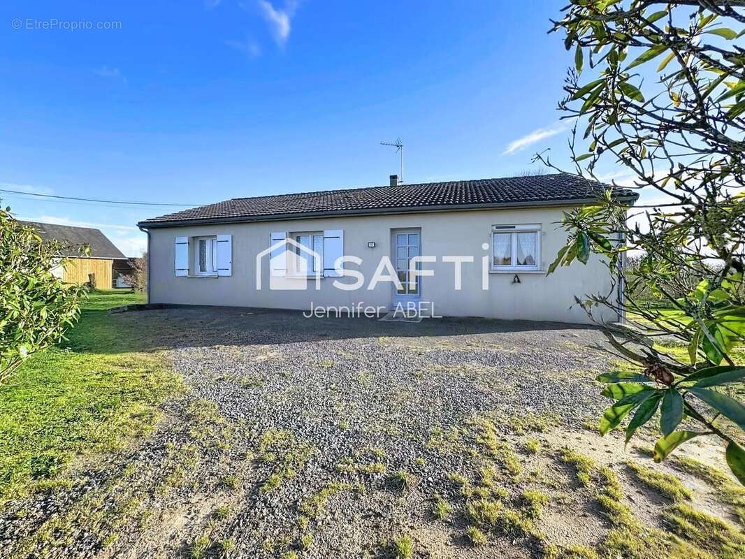 Photo 2 - Maison à LA CHAPELLE-SAINT-LAURENT