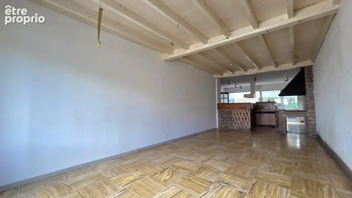 Immeuble comprenant une surface commerciale, une maison et un garage, situé en centre ville de Fourmies - photo 5
