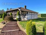 Photo 1 - Maison à YGOS-SAINT-SATURNIN