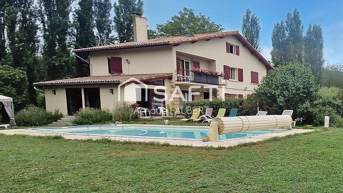 Photo 1 - Maison à PRAT-BONREPAUX