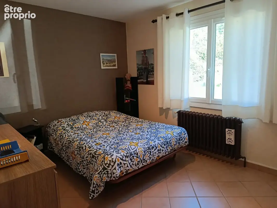 A vendre belle maison de 137 m2 sur un terrain de 3853 m2 à JASSERON - photo 9