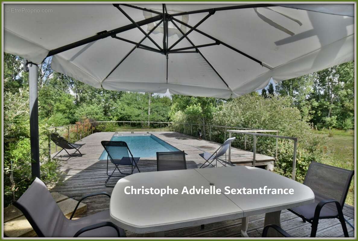 Villa d'architecte ossature bois, plain pied , 4 chambres , piscine, garage et atelier sur 1,6 Ha - photo 15