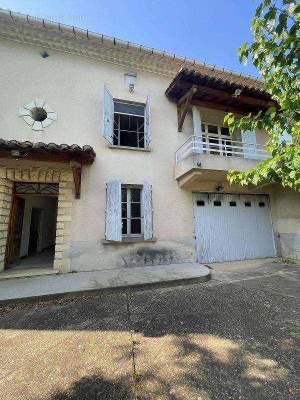 Maison à LAUDUN-L'ARDOISE