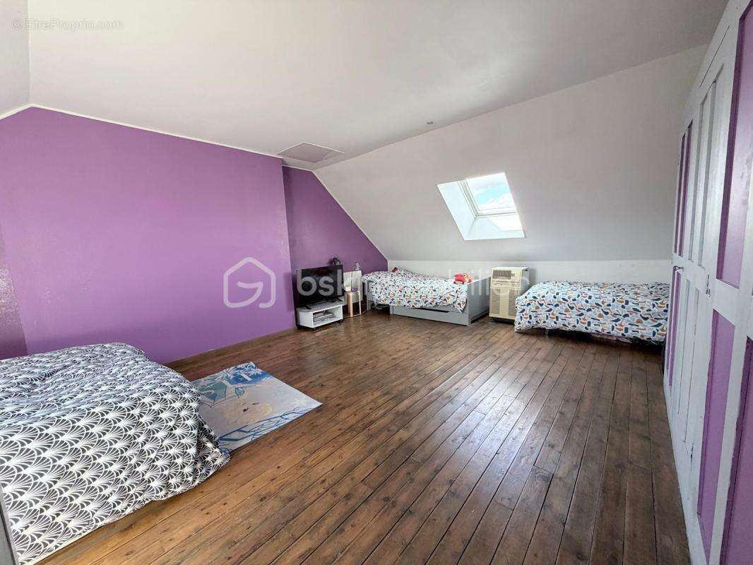 Maison familiale de 107 m² avec garage, jardin et dépendances à Saint-Quentin - photo 9