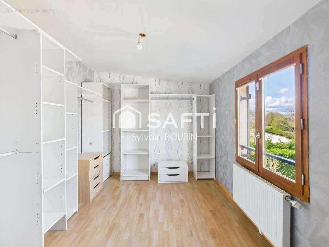 Photo 9 - Maison à JASSANS-RIOTTIER