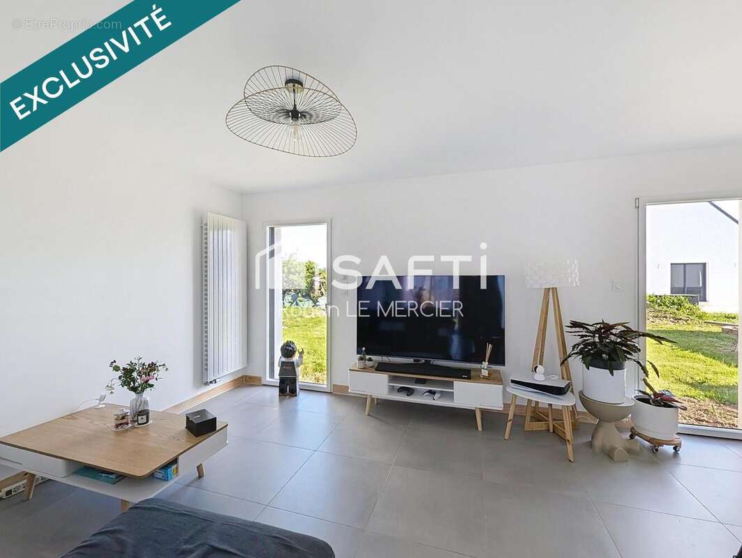 Maison 88 m² à Locmaria-Grand-Champ  - photo 4