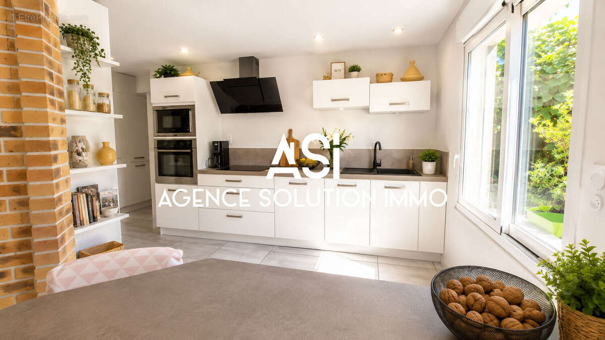 Maison - 156m² - 6 pièces - Quartier Avesnières - photo 7