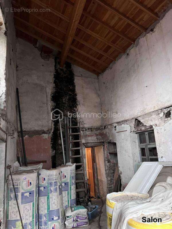 Maison en pierre R+1 de 144 m2 habitable avec combles de 63 m2 et cave voutée en sous sol de 88 m2 - photo 10