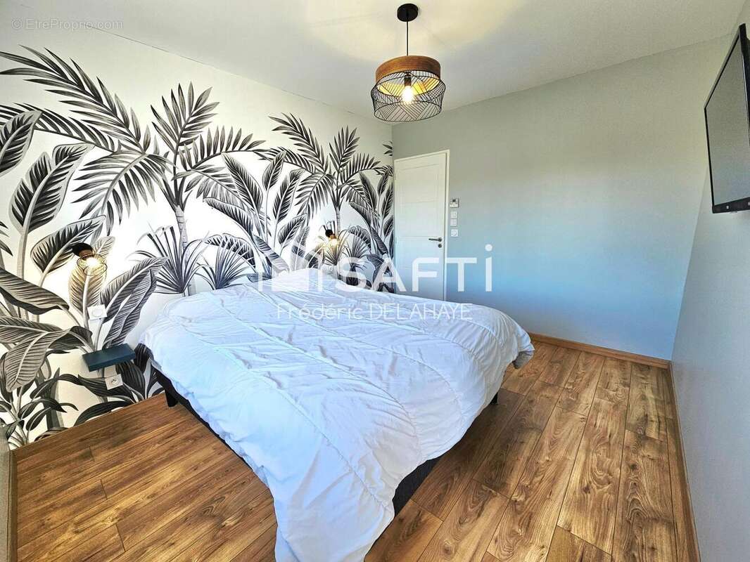 Maison 112 m² à Saint-Laurent-Medoc  - photo 9