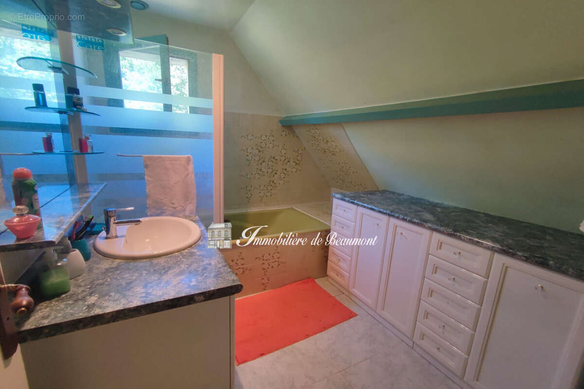 Maison 87 m² à Beaumont-Le-Roger  - photo 7