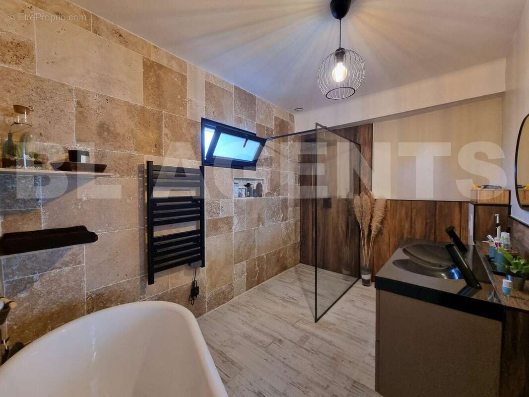 1000020543 (2) - Maison à LIEUSAINT