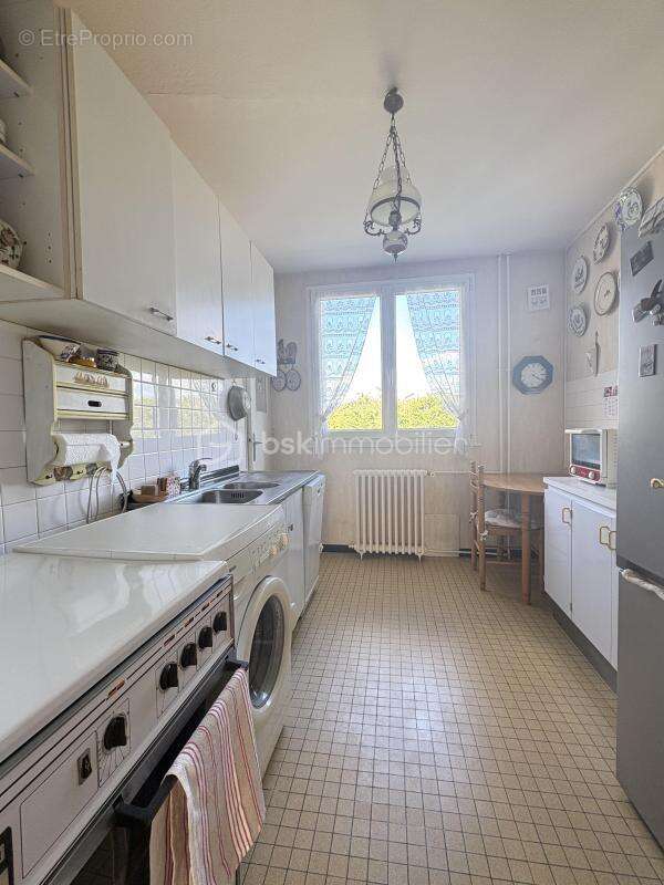 Appartement 70 m² – 3 chambres – Balcon – Parking en box – Cave – Résidence sécurisée - photo 2