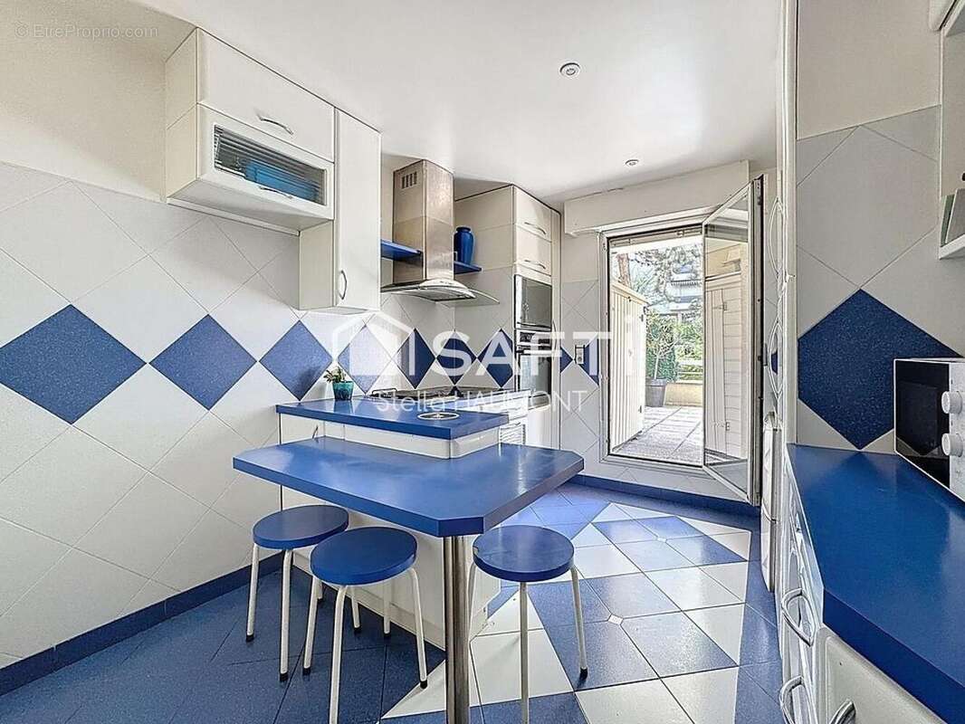 Photo 7 - Appartement à COURBEVOIE