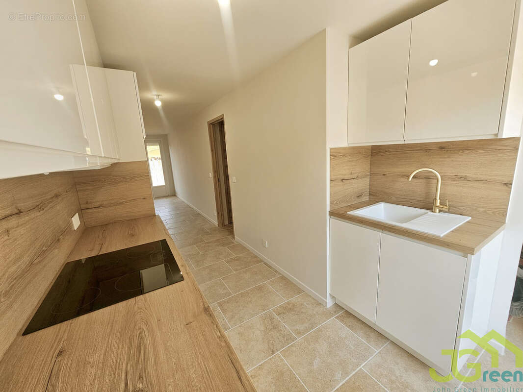 Appartement T4 entièrement rénové avec grande terrasse et parking privé - photo 4