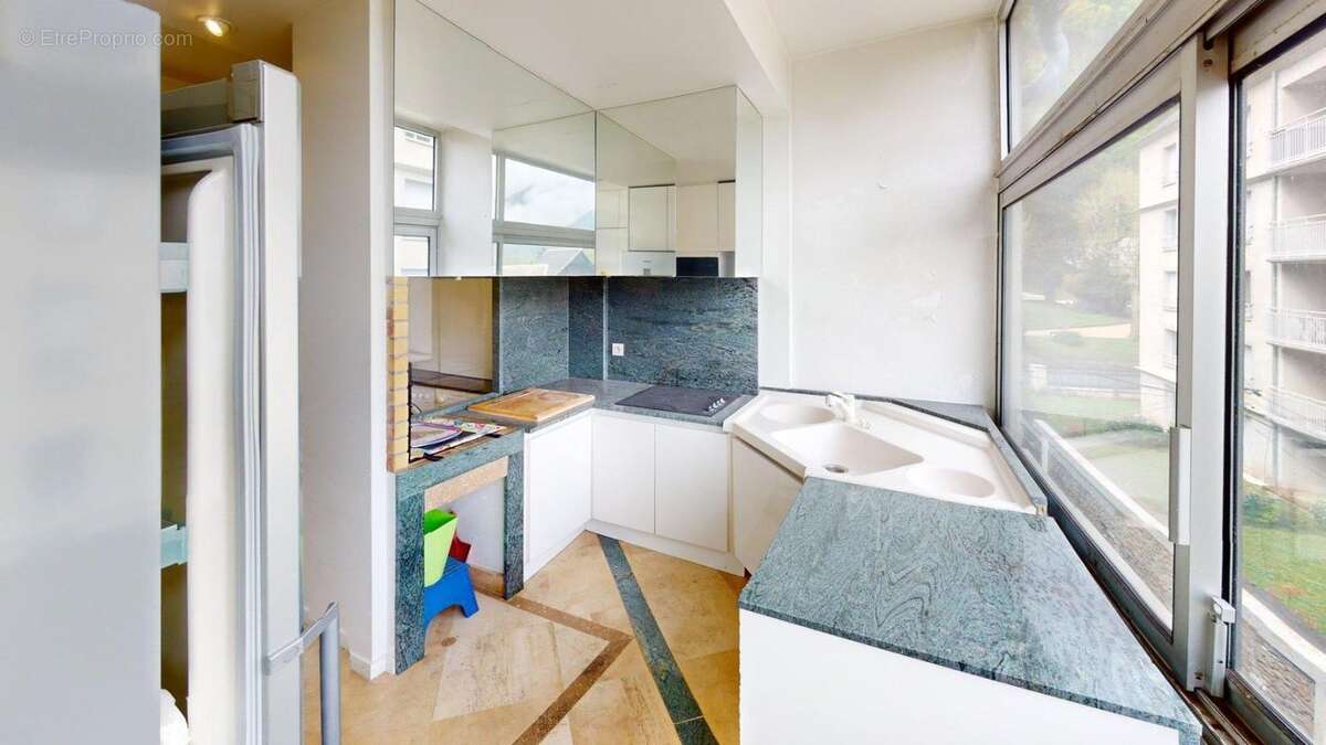 Charmant appartement de type 4 de 112 m² avec Terrasse Plein Sud et Vue Panoramique à Bagnères-de-Luchon - photo 18