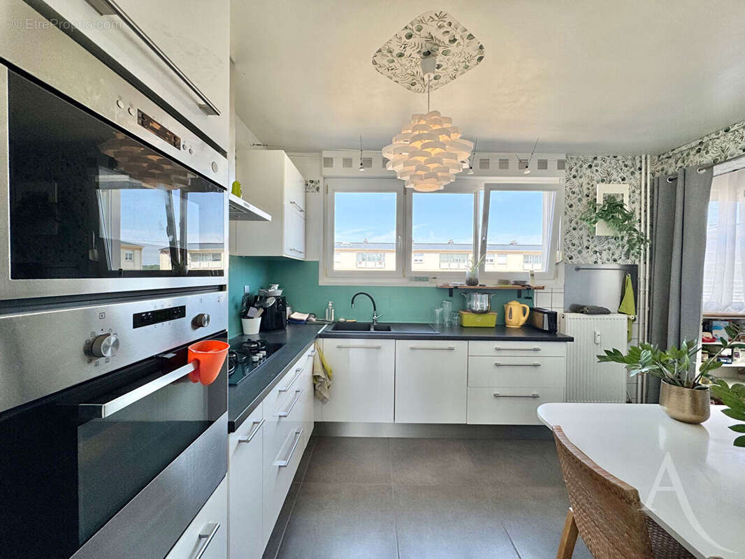 COUP DE COEUR sur ce spacieux T5 avec garage, ascenseur et grand balcon ! Proche centre ville - photo 6
