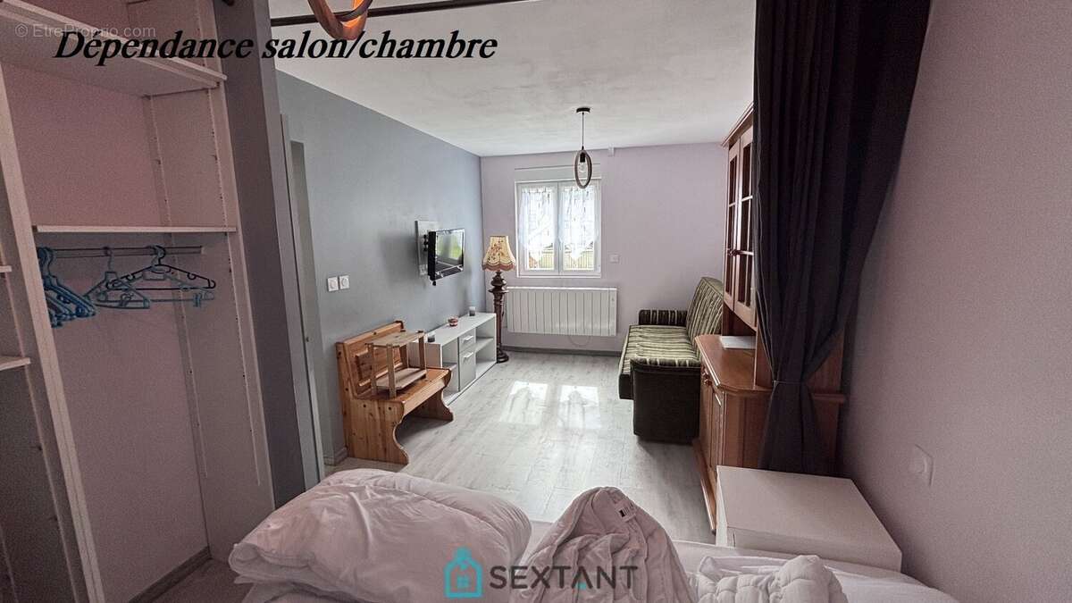 Pavillon familial de 140 m² avec dépendance aménagée, sous-sol complet et grand terrain de 1 000 m² - photo 15
