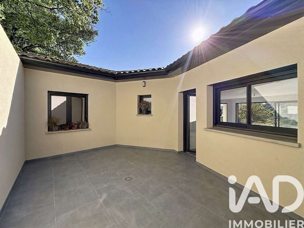 Photo 4 - Maison à GENISSIEUX