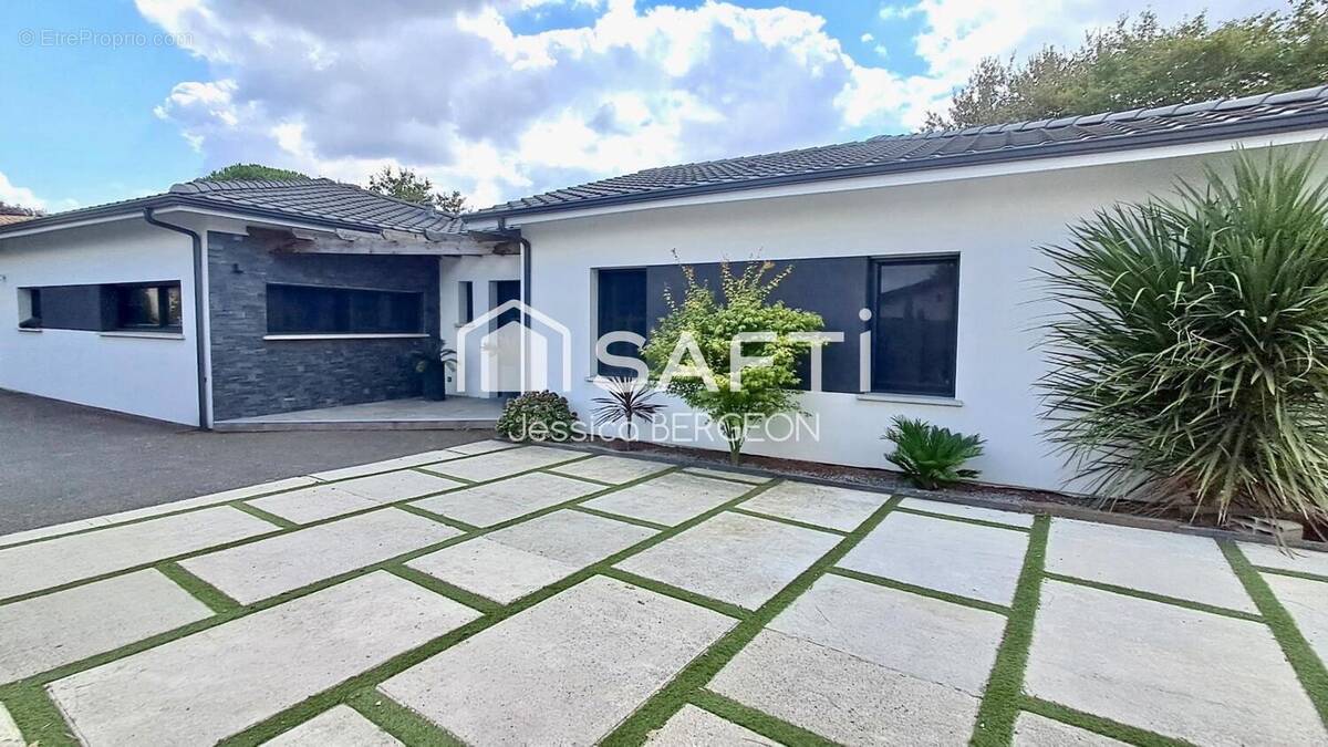 Photo 1 - Maison à SAINT-SULPICE-ET-CAMEYRAC