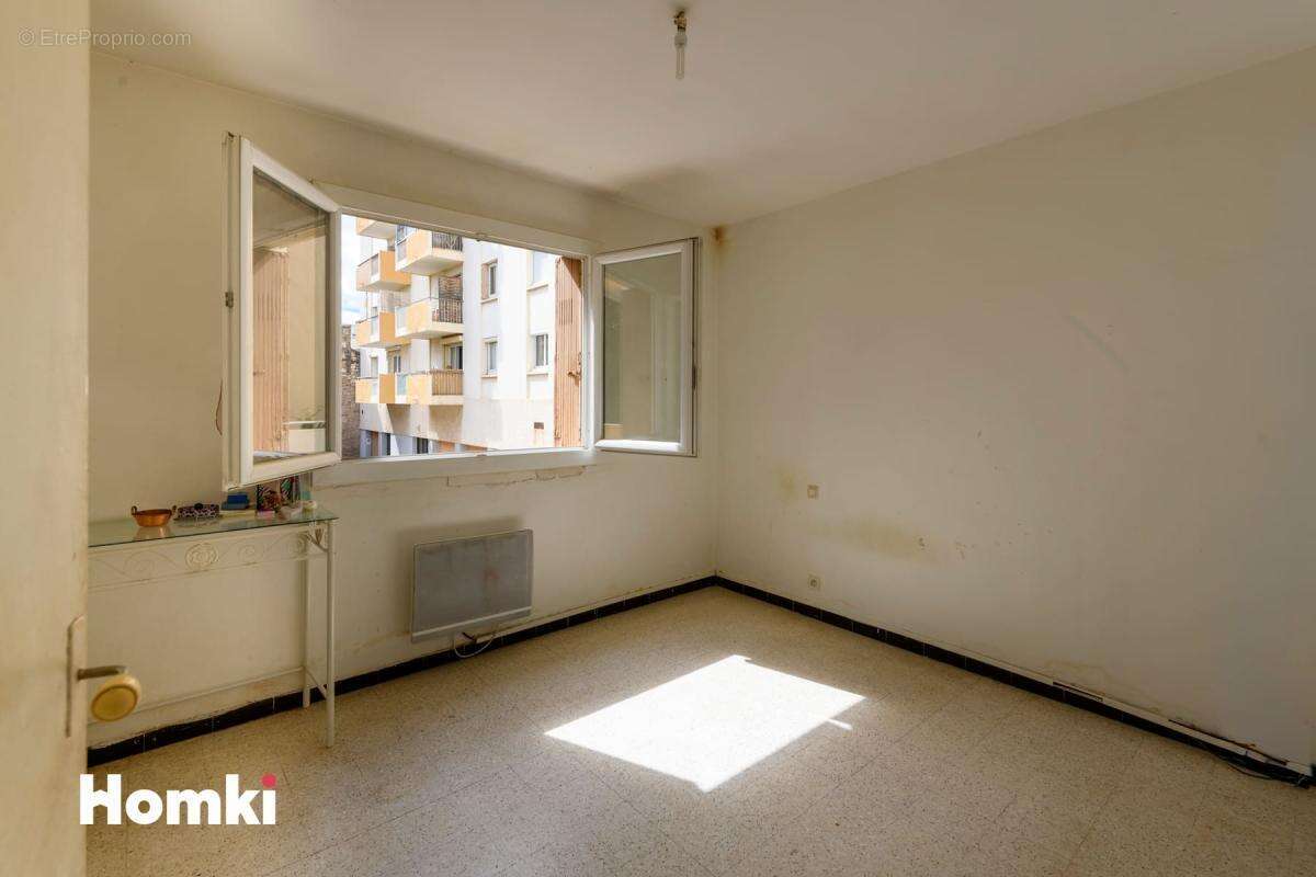 Appartement 3 pièces  de 67 m²  avec balcon à Nîmes, Rue Cordier - photo 8