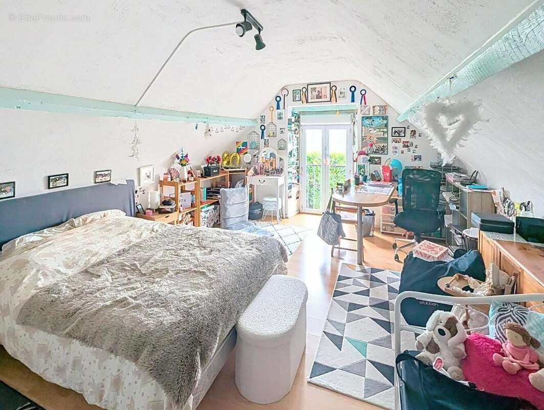 Photo 8 - Maison à PELLOUAILLES-LES-VIGNES