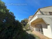 Maison à SAINT-HILAIRE-D'OZILHAN