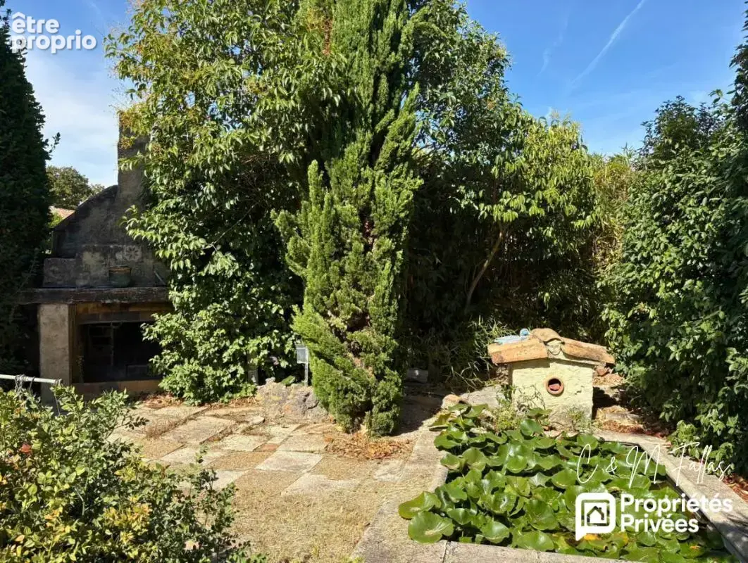 Maison plain pied, garage, jardin arboré, centre village - photo 7