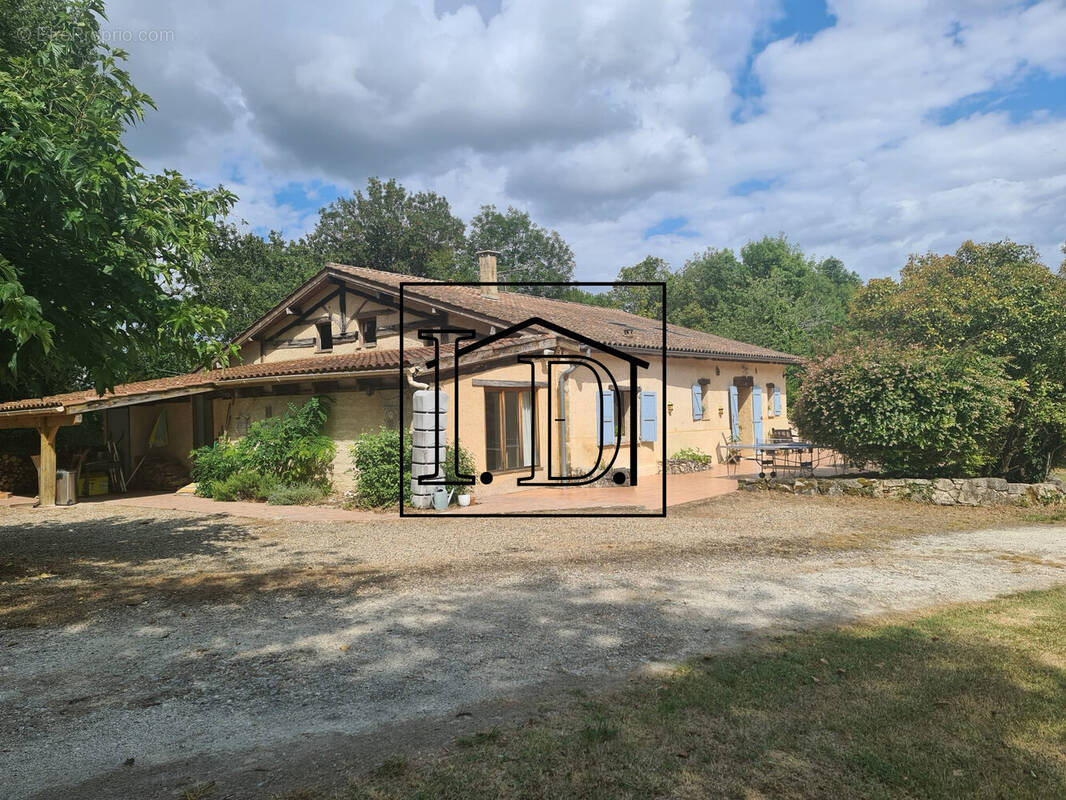 MAISON Façade côté ouest - Maison à BOURGOUGNAGUE