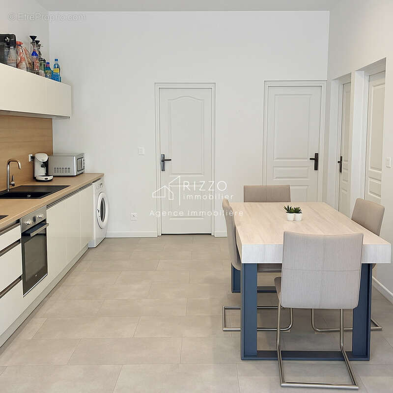 PERON   Appartement T4 avec terrasse, jardin et 2 parkings - photo 6