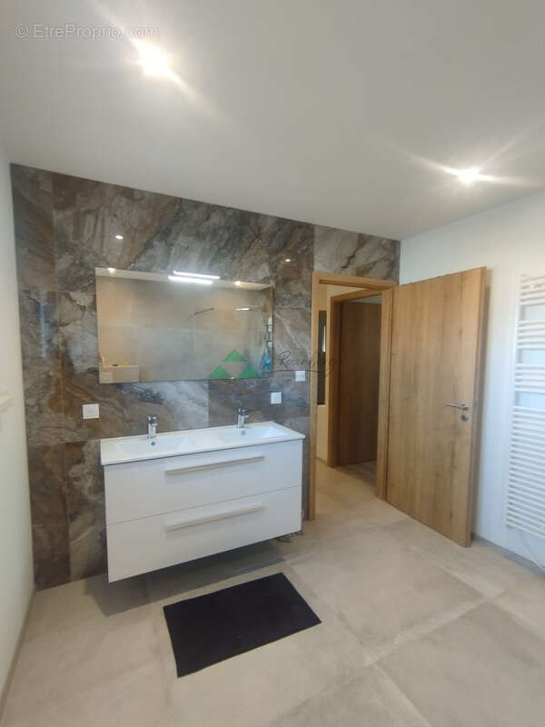 Maison individuelle construite en 2022 d'environ 90m2 sur un terrain de 3,92 ares proche de la frontière Suisse - photo 8