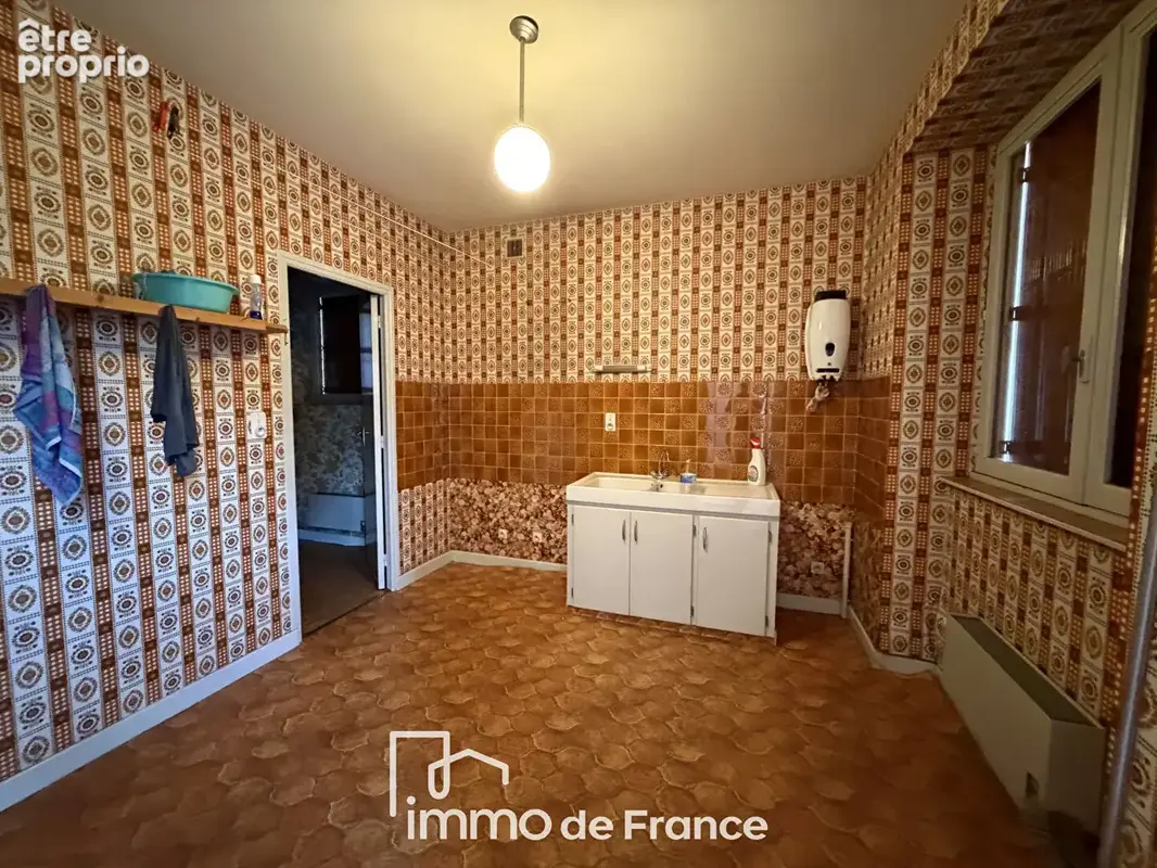 Proche centre-ville- Maison ( 104m2 habitables) avec garage et appartement. - photo 9