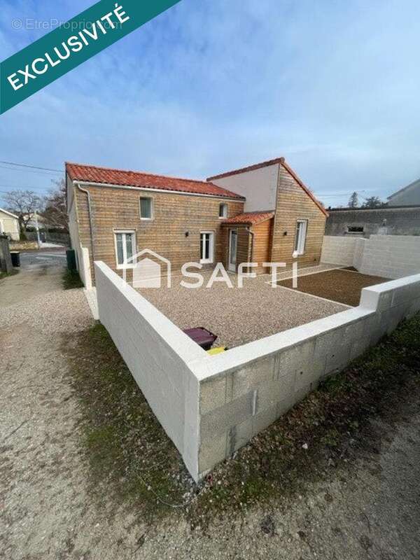 Photo 2 - Maison à L'ISLE-D'ESPAGNAC
