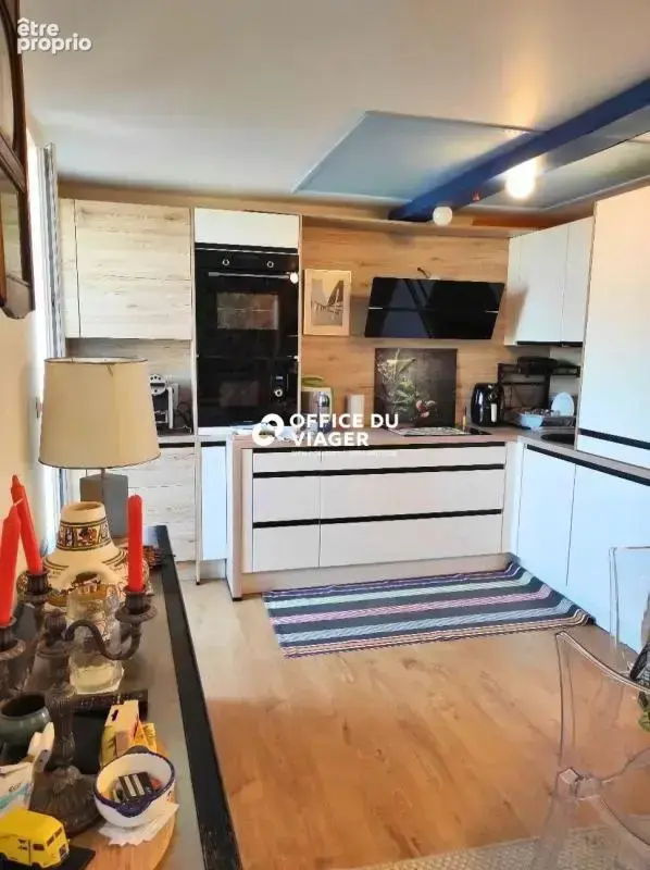 Ensemble immobilier - 1 appartement + 1 local commercial - 126,10 m² - photo 7