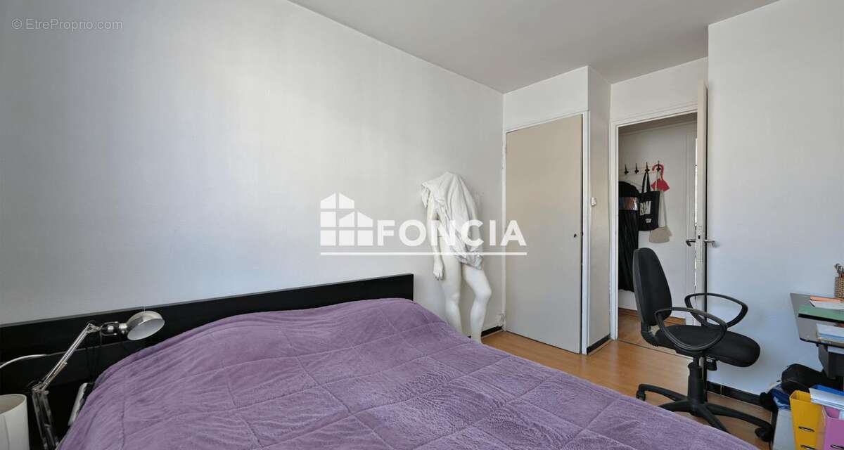 À vendre – Appartement T2 traversant de 52 m² avec terrasse, garage, cave et locataire en place - photo 8